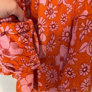 Pink and orange floral print free People top!